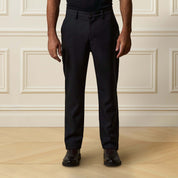 Check Pants in Black/Charcoal worn by a model, showcasing tailored fit and subtle checkered pattern.