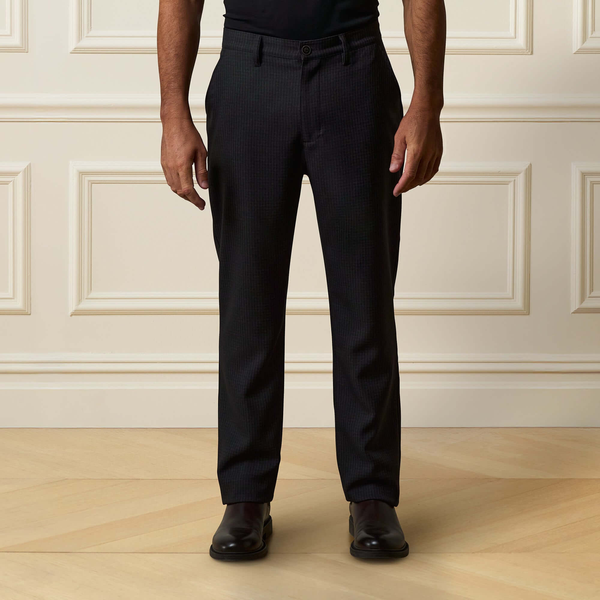 Check Pants in Black/Charcoal worn by a model, showcasing tailored fit and subtle checkered pattern.