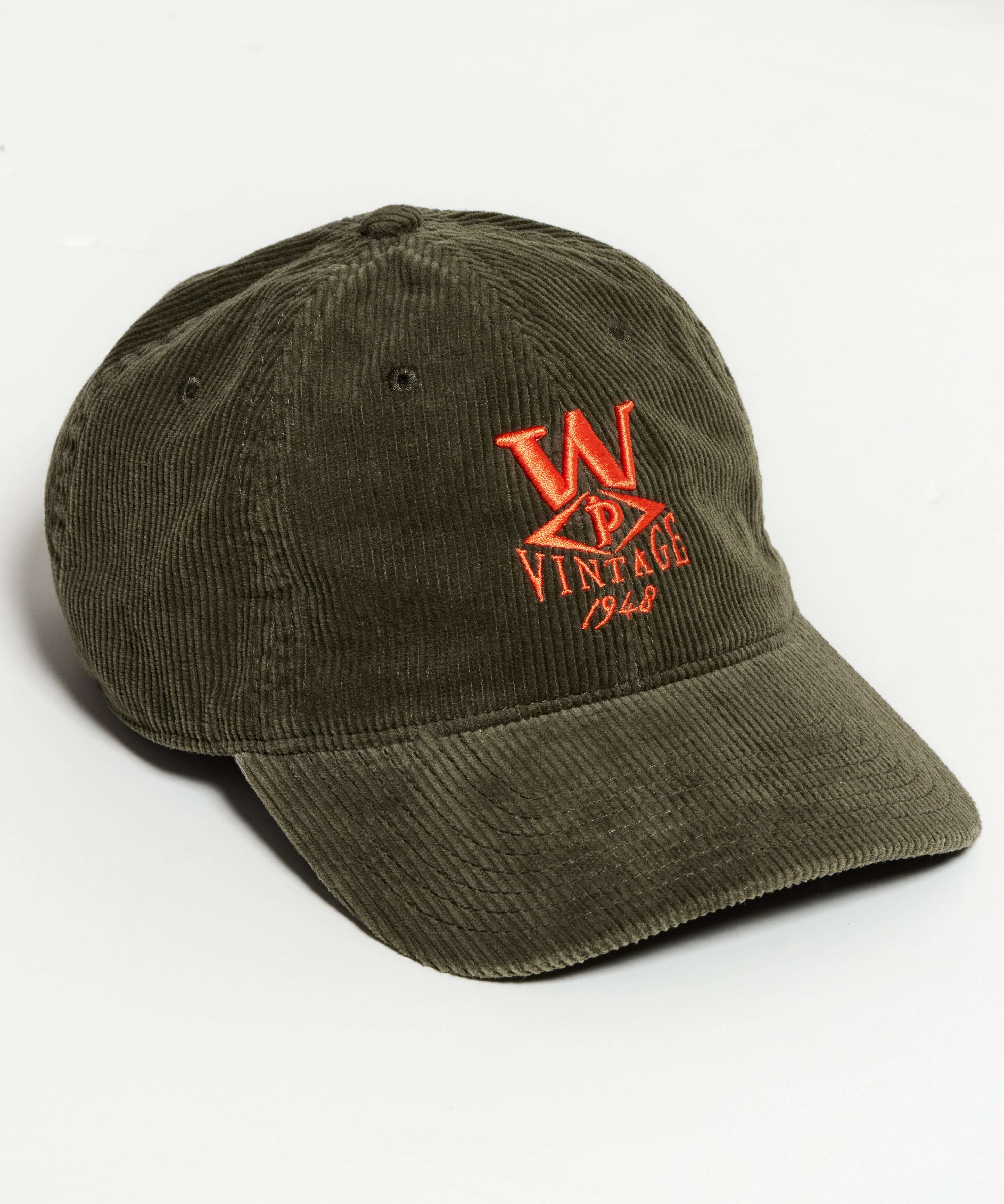 Corduroy Relaxed Hat in Olive featuring a vintage logo design, perfect for staying stylish and warm this season.