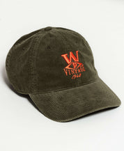 Corduroy Relaxed Hat in Olive featuring a vintage logo design, perfect for staying stylish and warm this season.