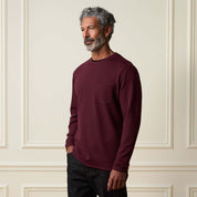 Crinkle Scuba Crew Neck in Burgundy worn by a model, featuring a relaxed fit and long sleeves.