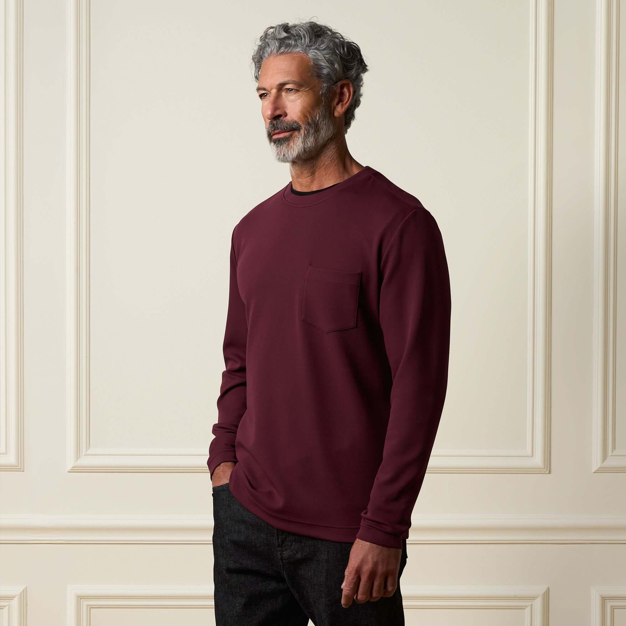Crinkle Scuba Crew Neck in Burgundy worn by a model, featuring a relaxed fit and long sleeves.