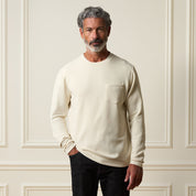 Model wearing Crinkle Scuba Crew Neck in Ivory, showcasing its soft, textured fabric and relaxed fit.