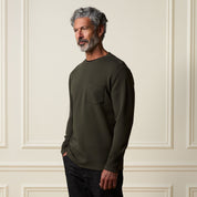 Crinkle Scuba Crew Neck in Olive on a model with gray hair and beard, styled for casual elegance.