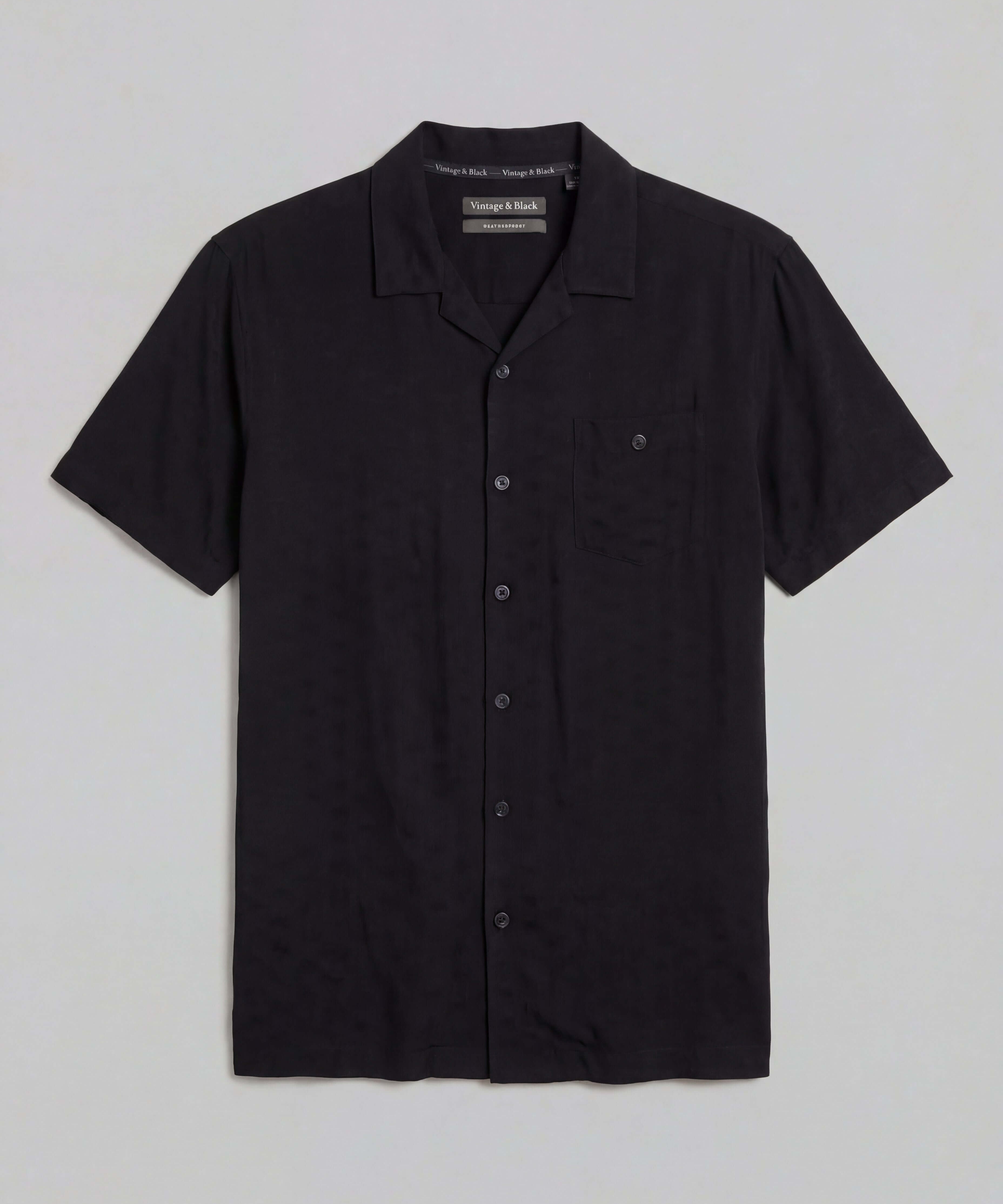 The Dobby Camp Collar Shirt in Black, short sleeve, button-front, chest pocket, lightweight rayon.