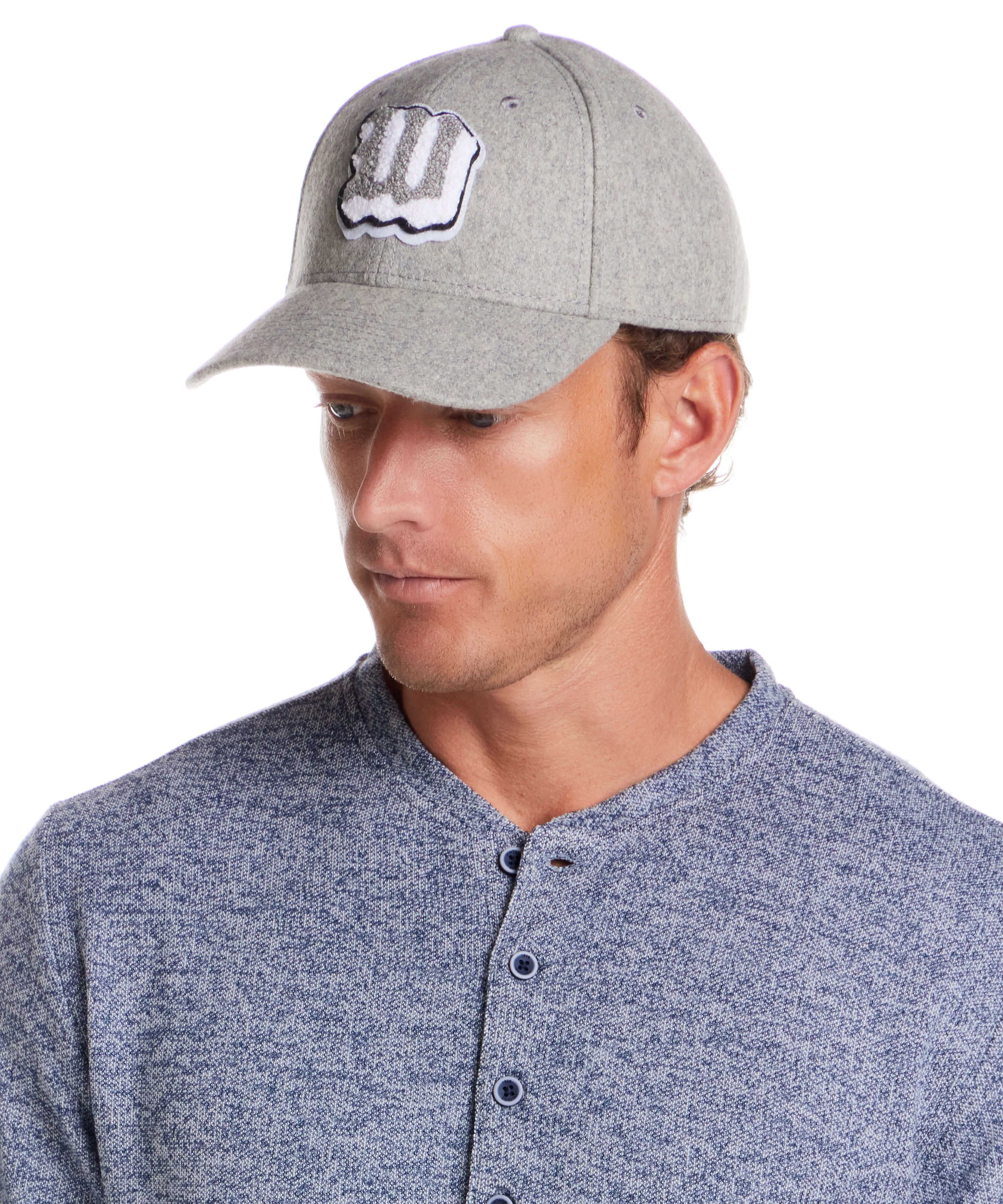 Flannel cap with Appliqué in Light Grey worn by a man in a grey cap, showcasing style and warmth.