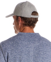 Flannel cap with Appliqué in Light Grey worn by a man from behind, showcasing its premium wool design.