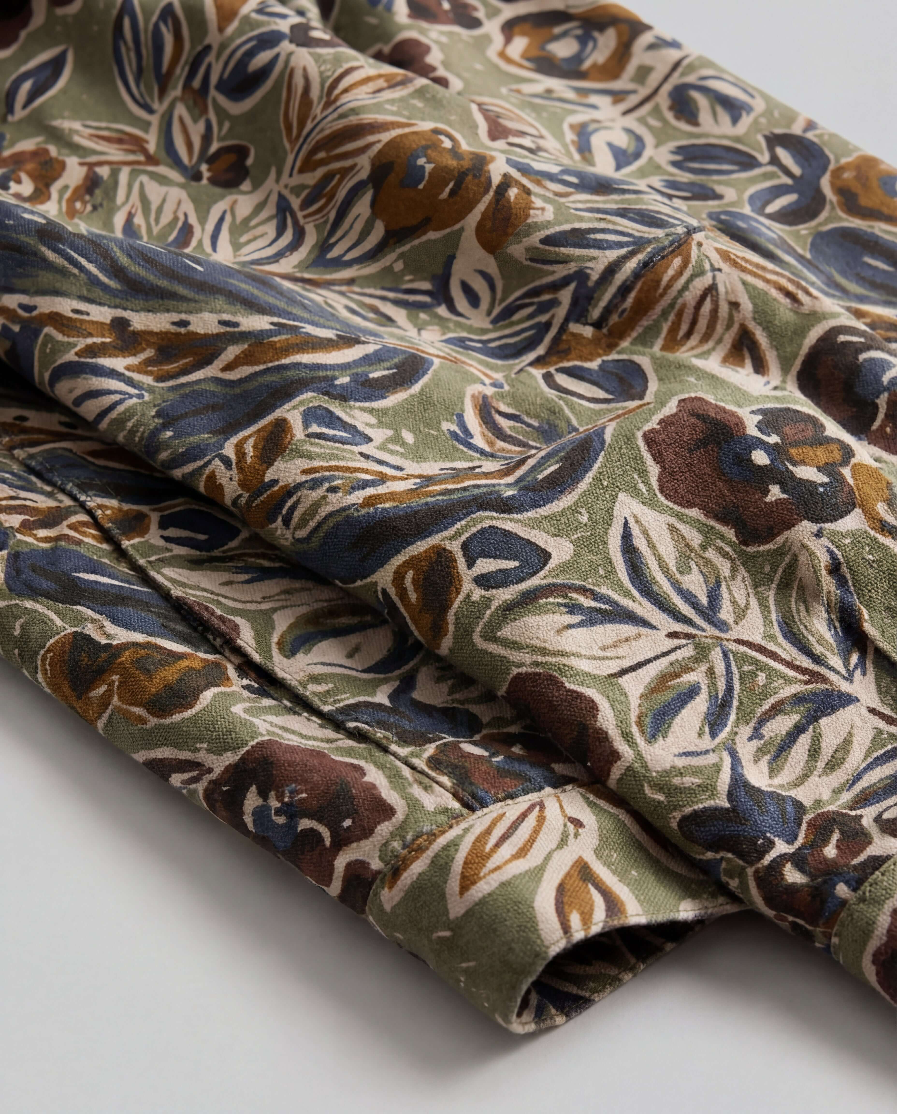 Floral Print Twill Trucker in Olive detailed fabric close-up showcasing muted floral pattern on cotton twill.