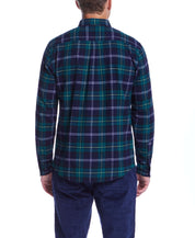 Back view of man wearing Holiday Antique Flannel in Verdant Green, showcasing its stylish plaid design.
