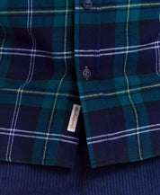 Detail of Holiday Antique Flannel in Verdant Green, showcasing plaid pattern and button details for cozy winter style.