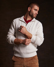 Man wearing an Ecru Holiday Cable Yoke Quarter Zip Sweater, styled for cozy casual living.