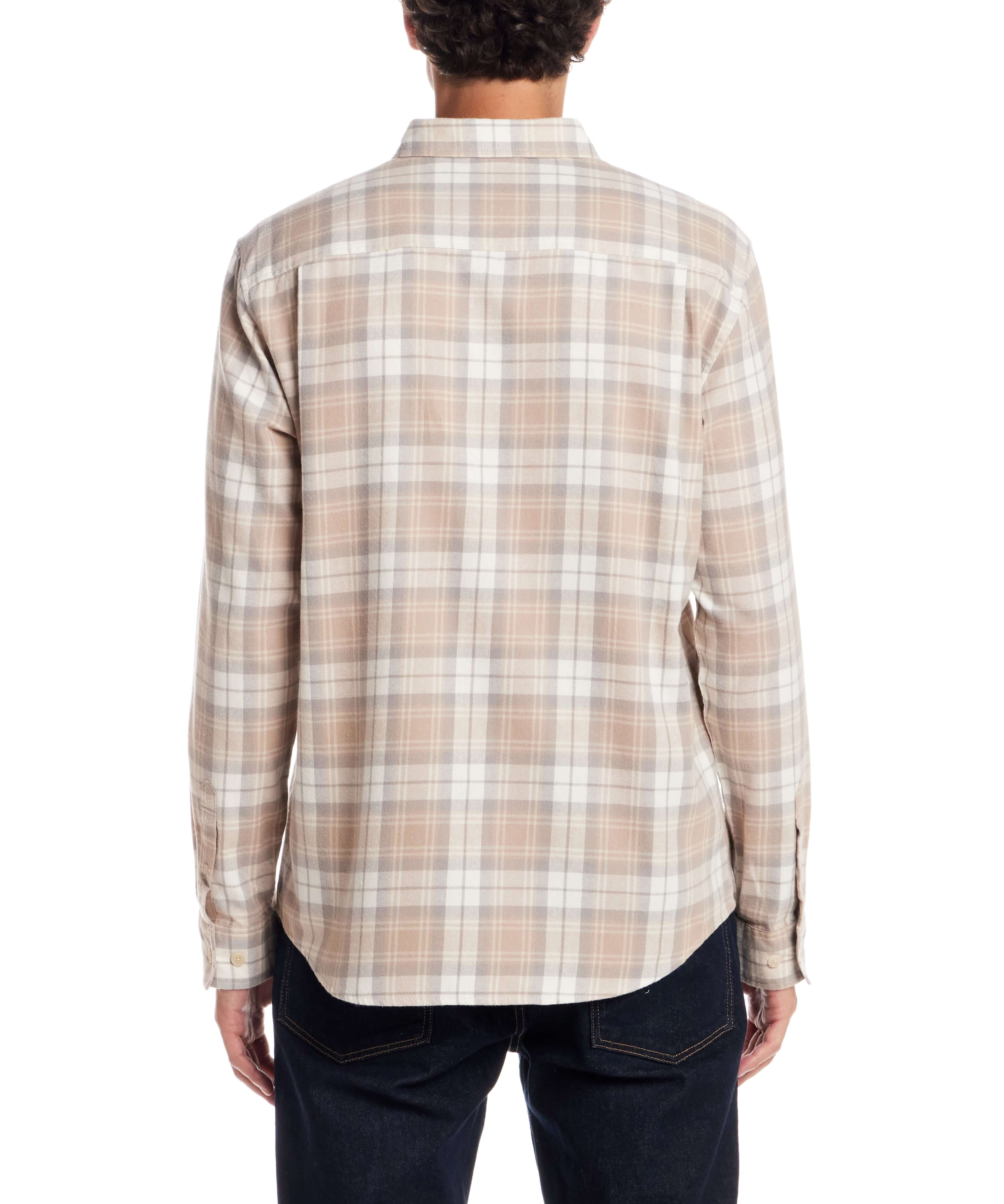 Back view of a model wearing a Long Sleeve Brushed Flannel in Beige, showcasing its classic plaid design.