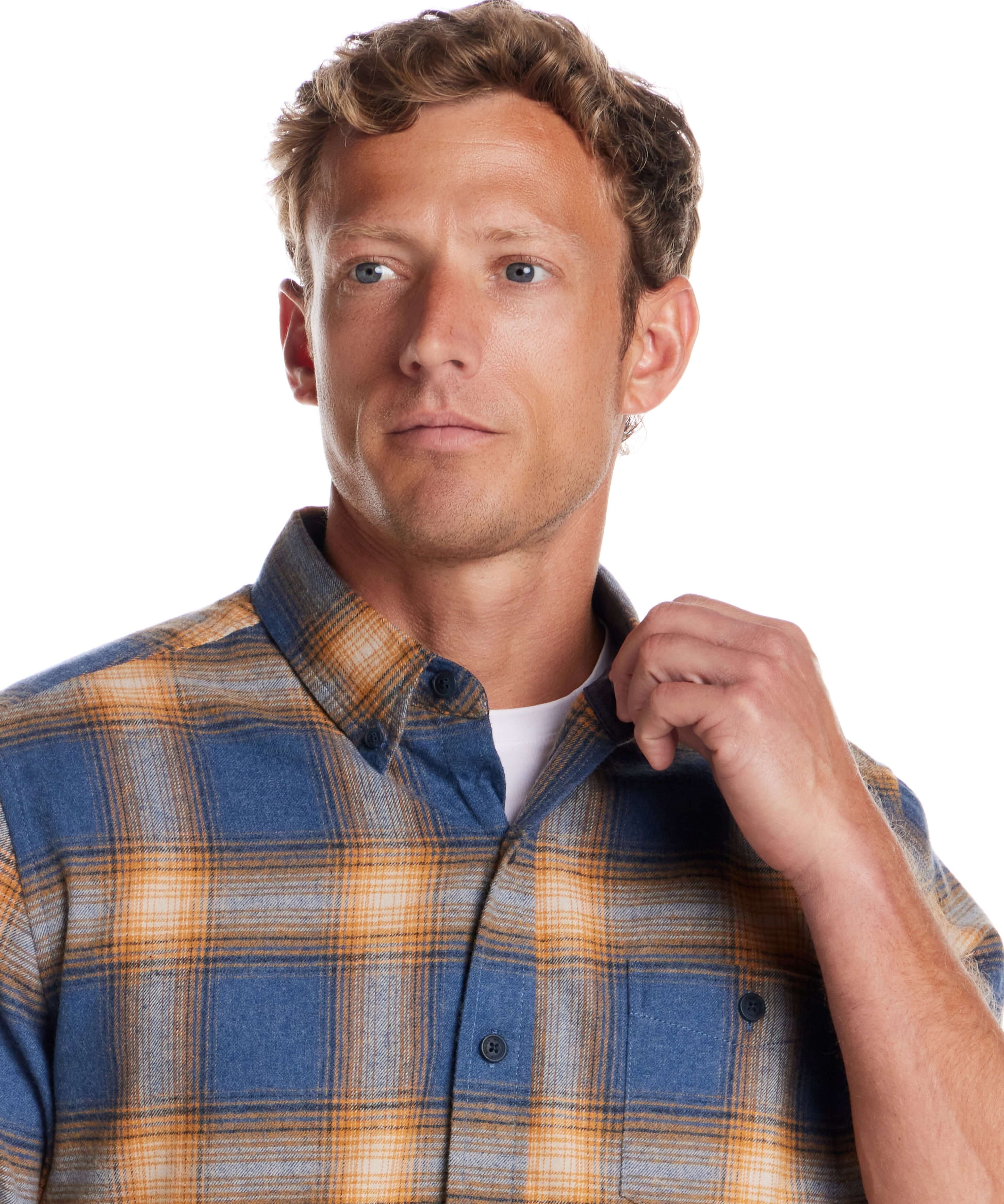Model wearing Long Sleeve Brushed Flannel in Delft Blue with button-down collar and chest pocket.