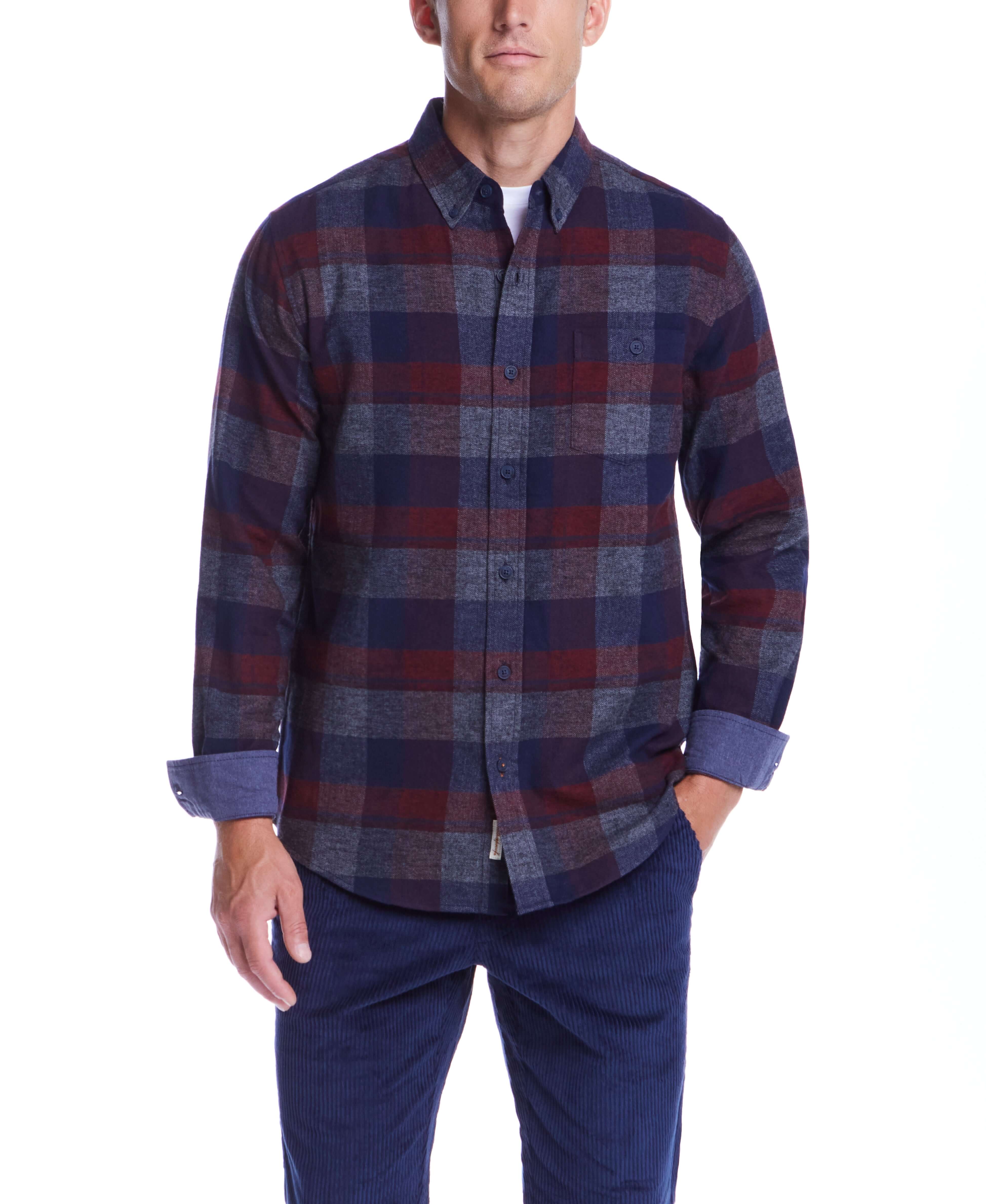 Model wearing a long sleeve brushed flannel shirt in red maroon plaid pattern.
