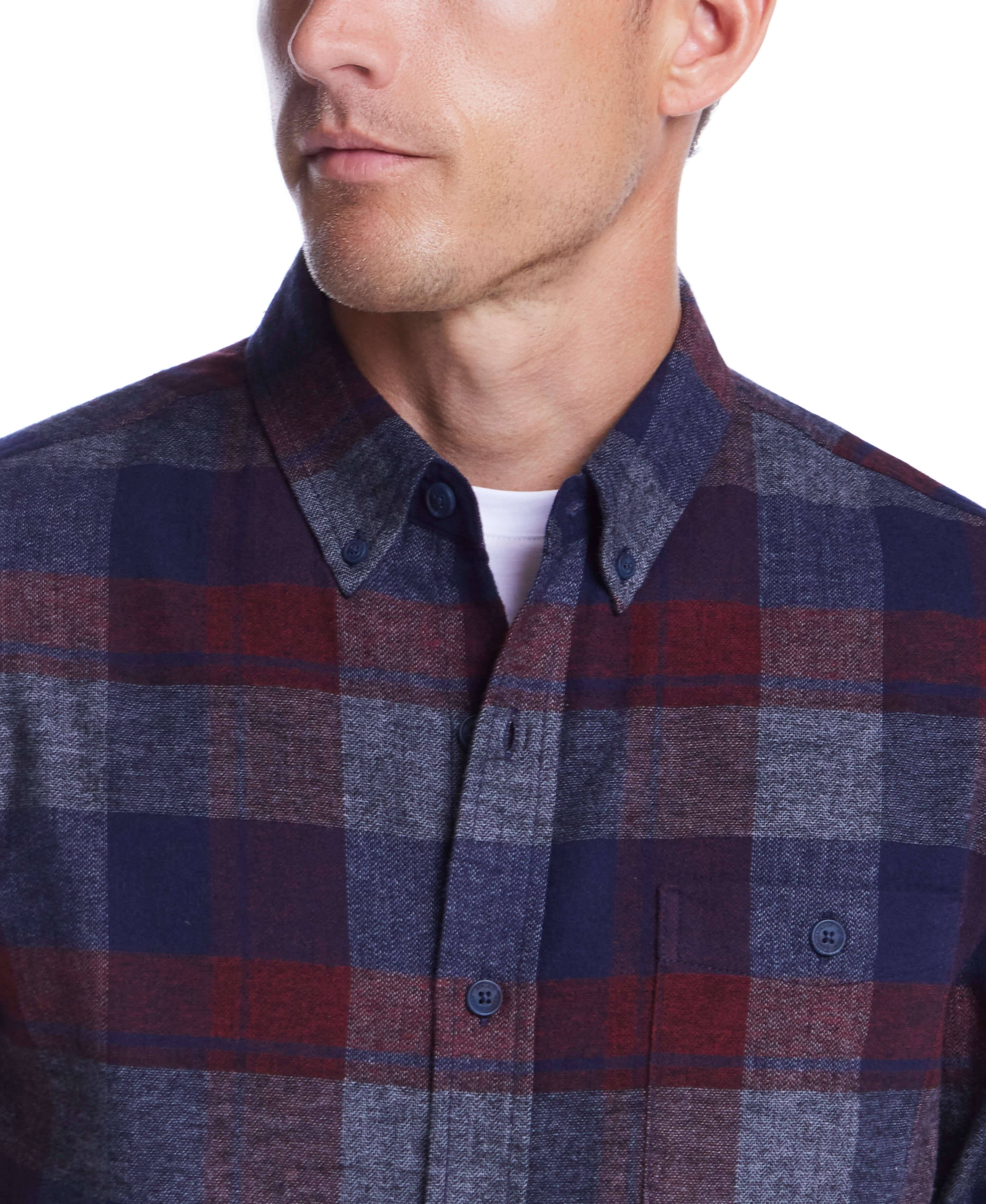 Man wearing a stylish red maroon brushed flannel shirt with a button-down collar and plaid pattern.