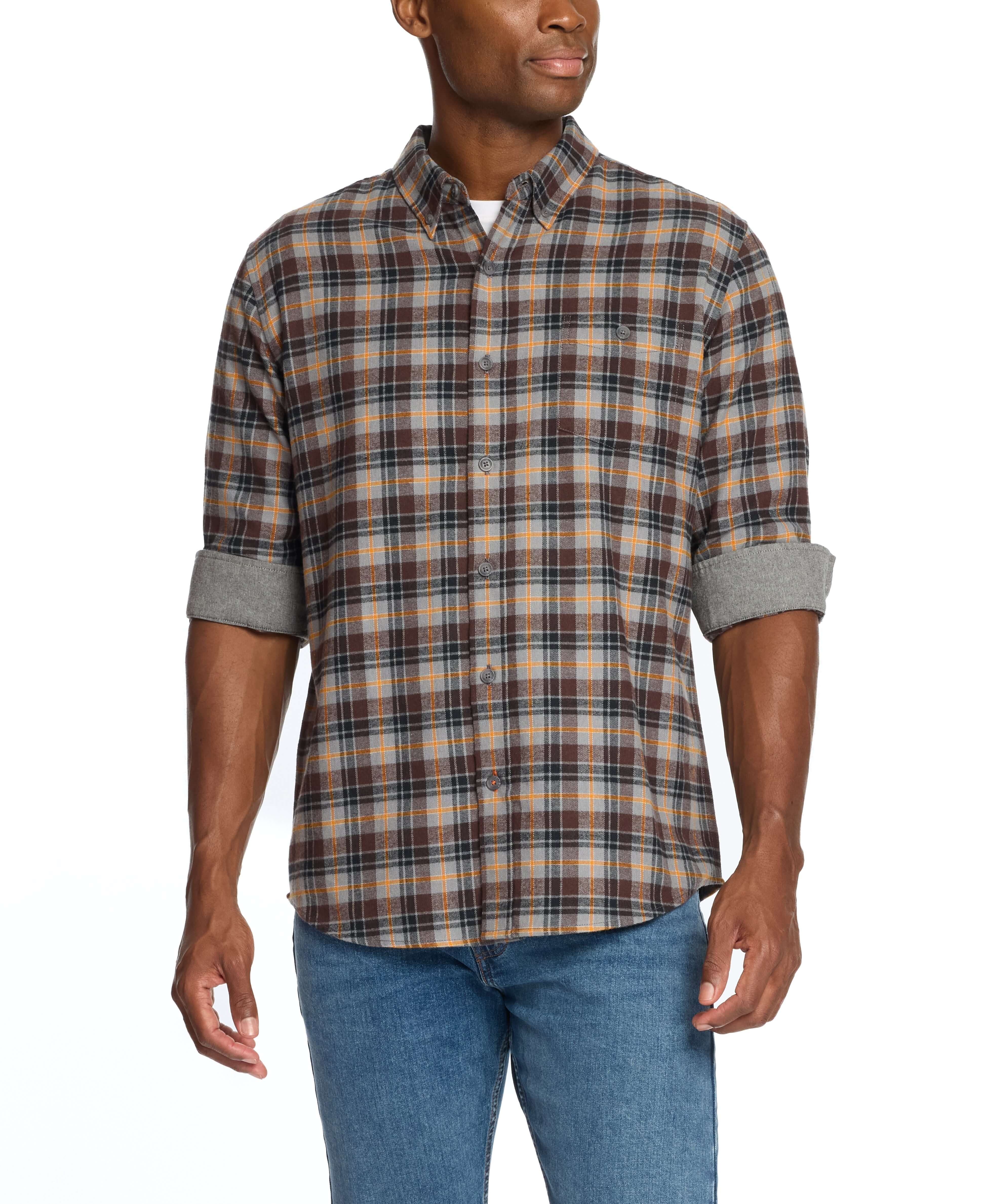 Man wearing a long sleeve brushed flannel shirt in sharkskin color with a plaid pattern, styled for casual comfort.