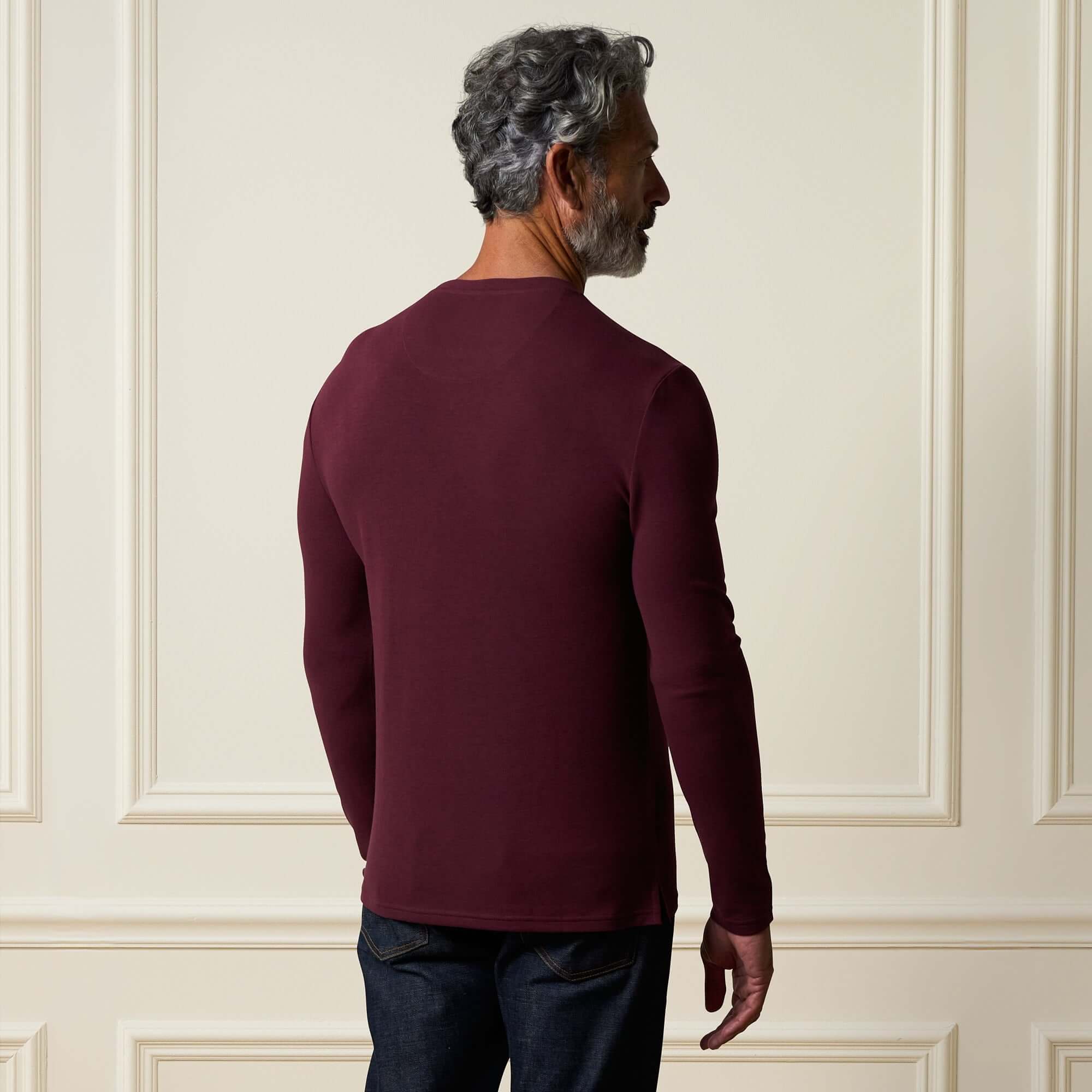 Long Sleeve Crew Neck in Burgundy, back view of a man wearing a burgundy crew neck shirt.