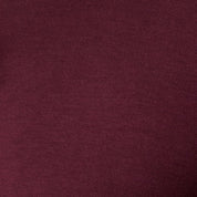 Close-up of fabric texture in Long Sleeve Crew Neck in Burgundy, showcasing its softness and rich color.