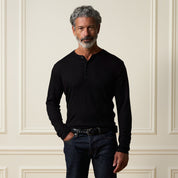 Long Sleeve Crinkle Henley in Black, featuring a relaxed fit and stylish crinkled texture.