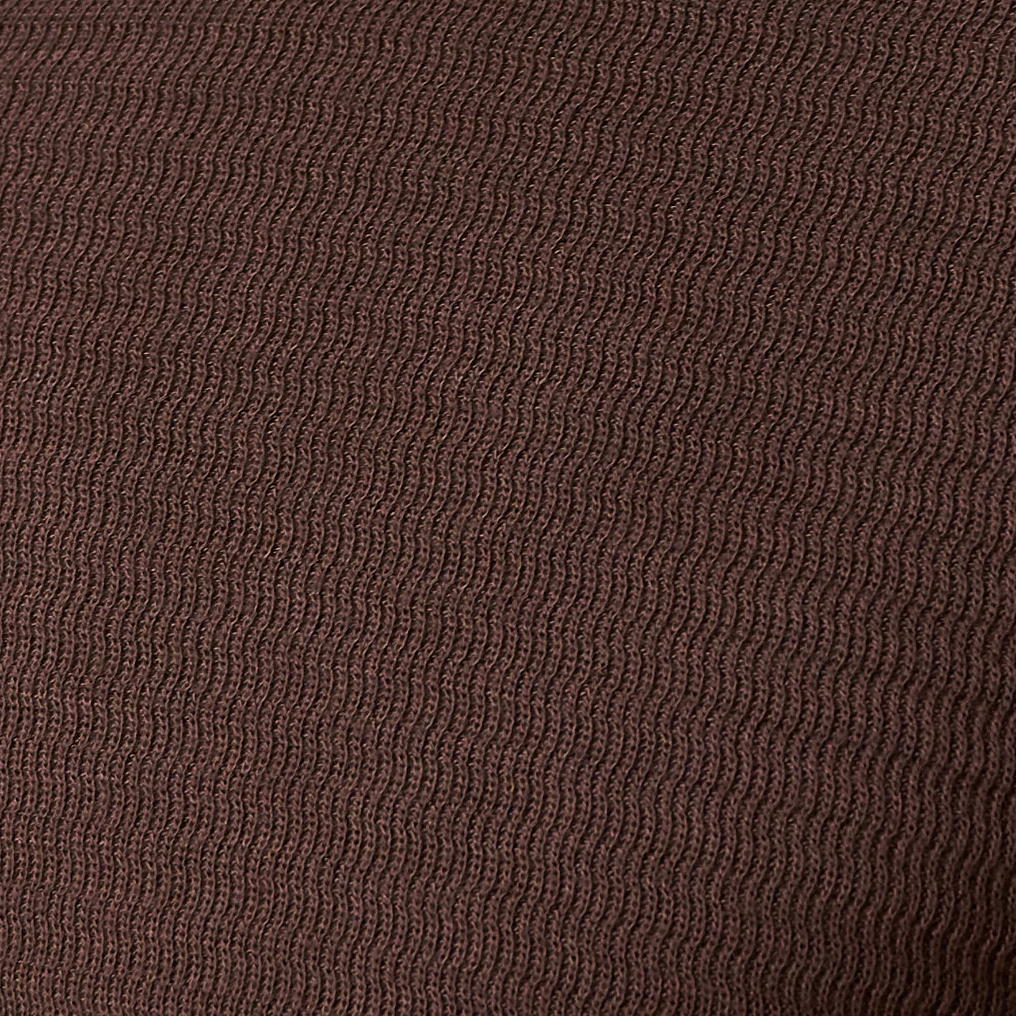 Long Sleeve Crinkle Henley in Brown fabric texture close-up highlighting its crinkled design.