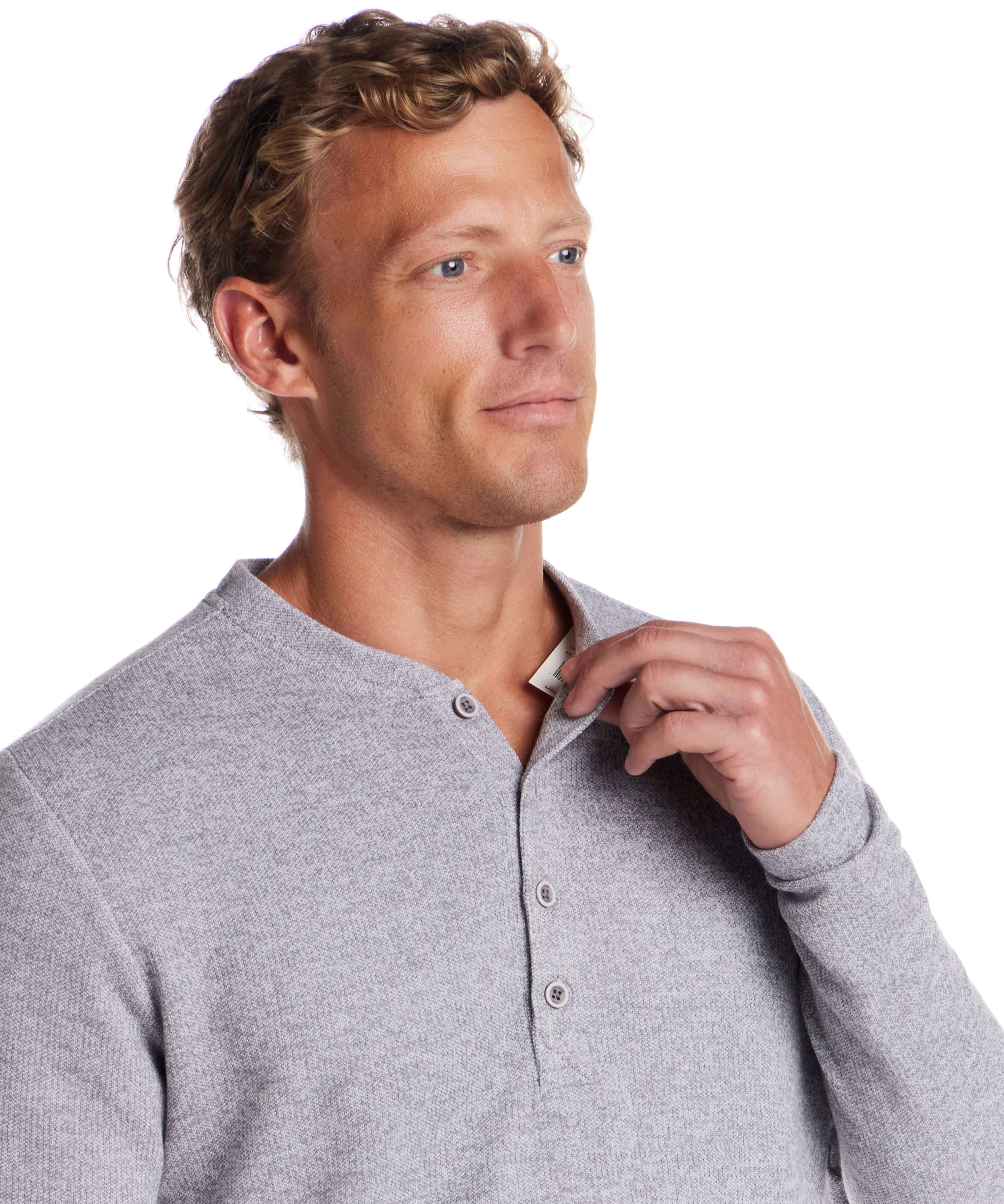 Model wearing Long Sleeve Mixy Henley in Grey, showcasing 4-button placket and ribbed cuffs.
