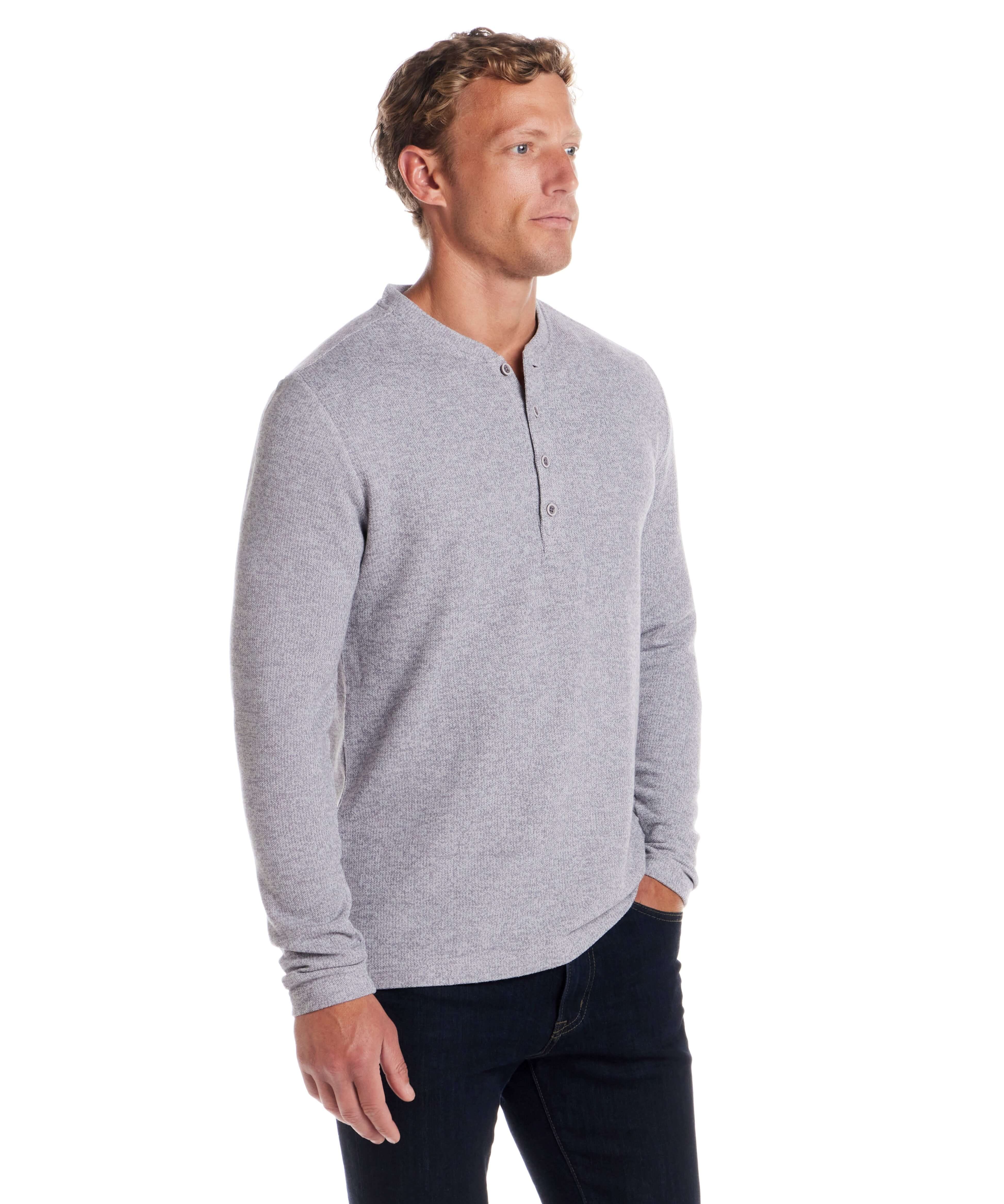 Long Sleeve Mixy Henley in Grey worn by a model, showcasing its classic 4-button placket and ribbed cuffs.