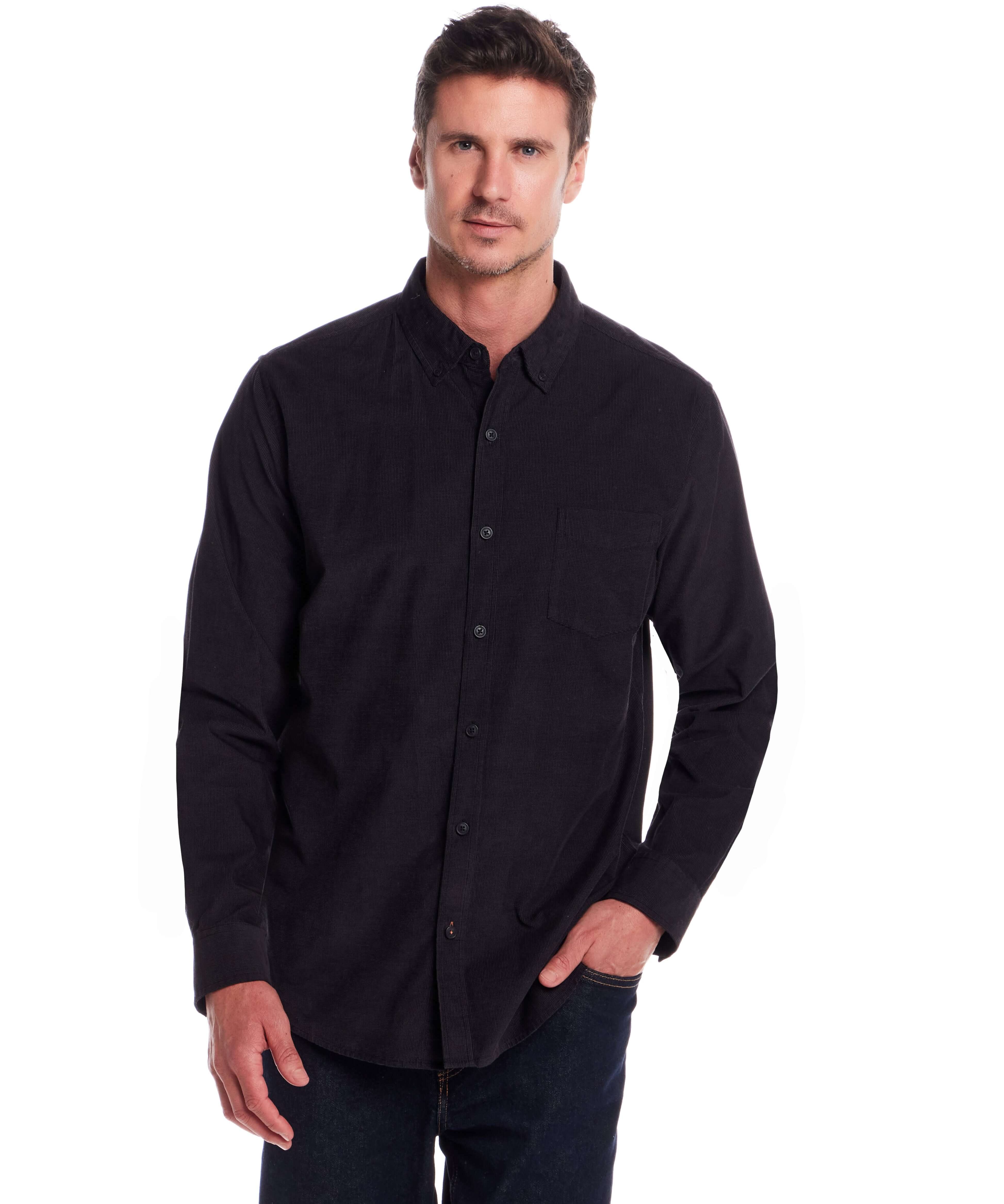 Long Sleeve Pebble Corduroy Shirt in Forged Iron modeled by a man with a button-down collar and single chest pocket.