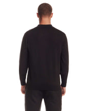Back view of a man wearing a Long Sleeve Polo Sweater in Black, highlighting its refined knit and comfortable fit.