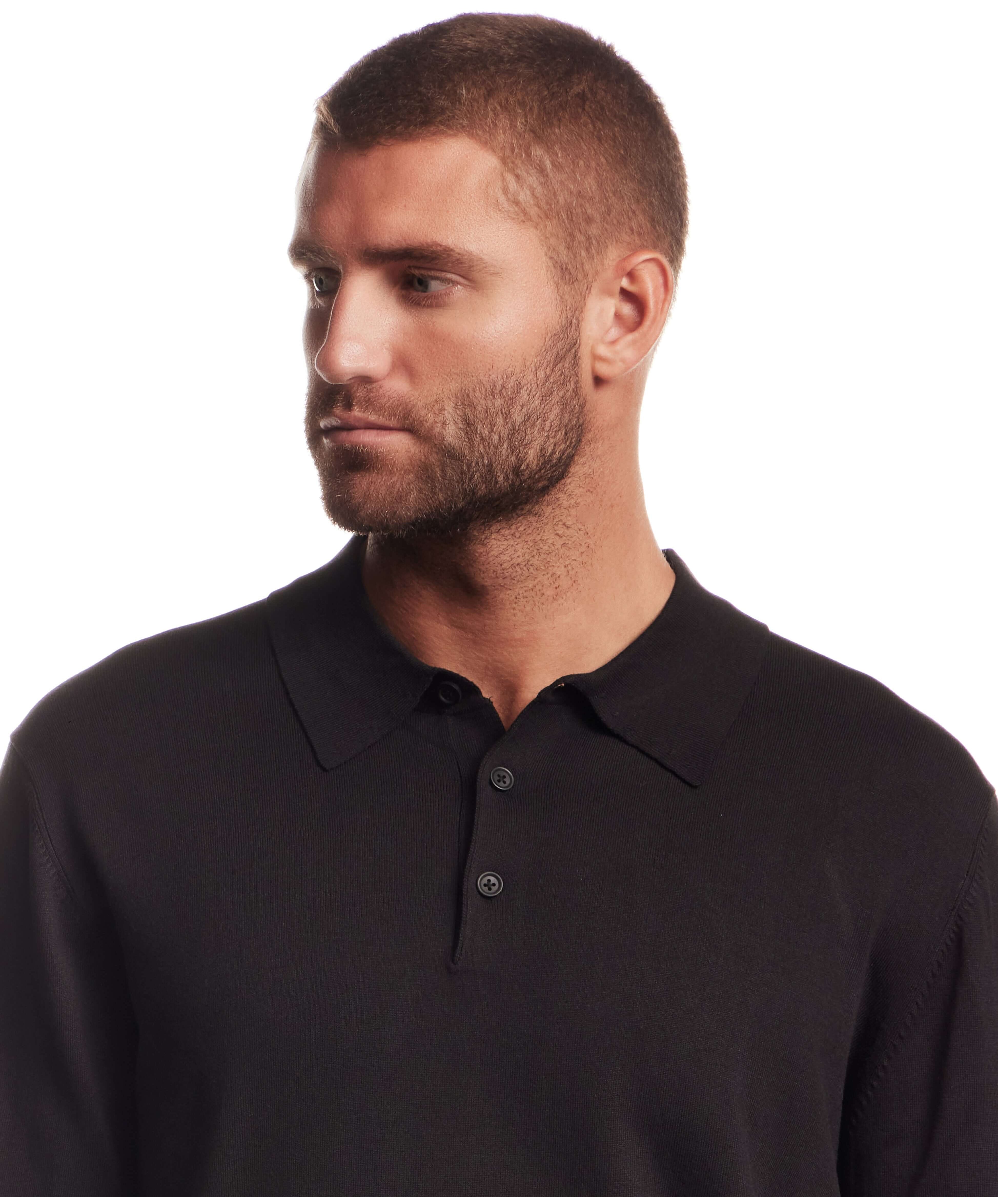 Model wearing a Long Sleeve Polo Sweater in Black featuring a polo collar and long sleeves.