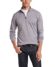 Long Sleeve Quarter Zip in Maritime Blue worn by a man, featuring a mock neck and quarter-zip closure.