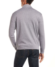 Model wearing Long Sleeve Quarter Zip in Maritime Blue, showcasing the back view and smooth texture.