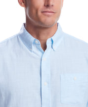 Long Sleeve Solid Cotton Twill Shirt In Crystal Blue on model showcasing button-down collar and chest pocket.