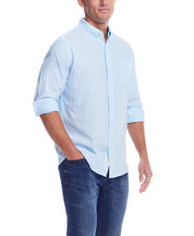 Long Sleeve Solid Cotton Twill Shirt In Crystal Blue on a model, showcasing its button-down collar and chest pocket.