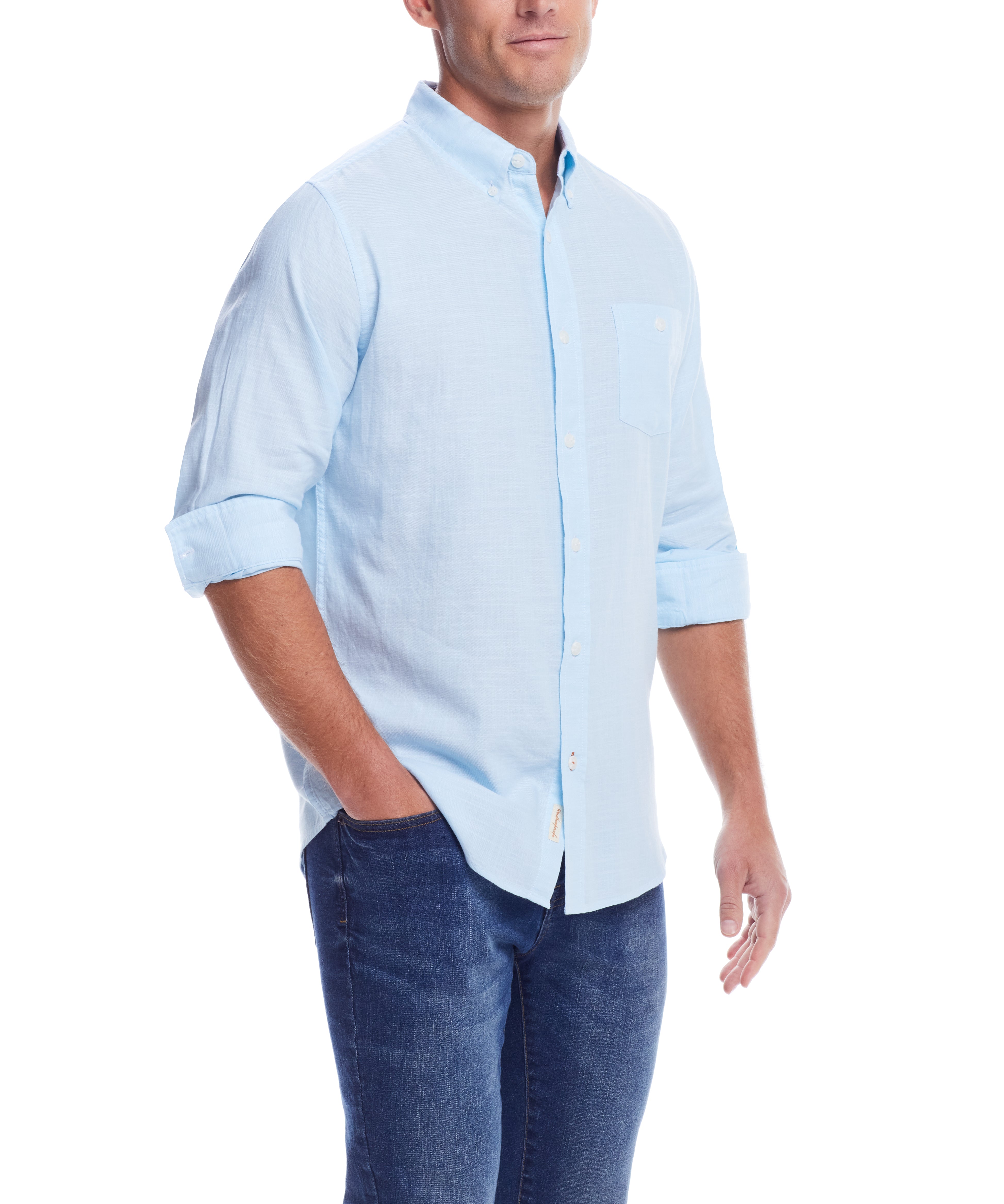 Long Sleeve Solid Cotton Twill Shirt In Crystal Blue on a model, showcasing its button-down collar and chest pocket.