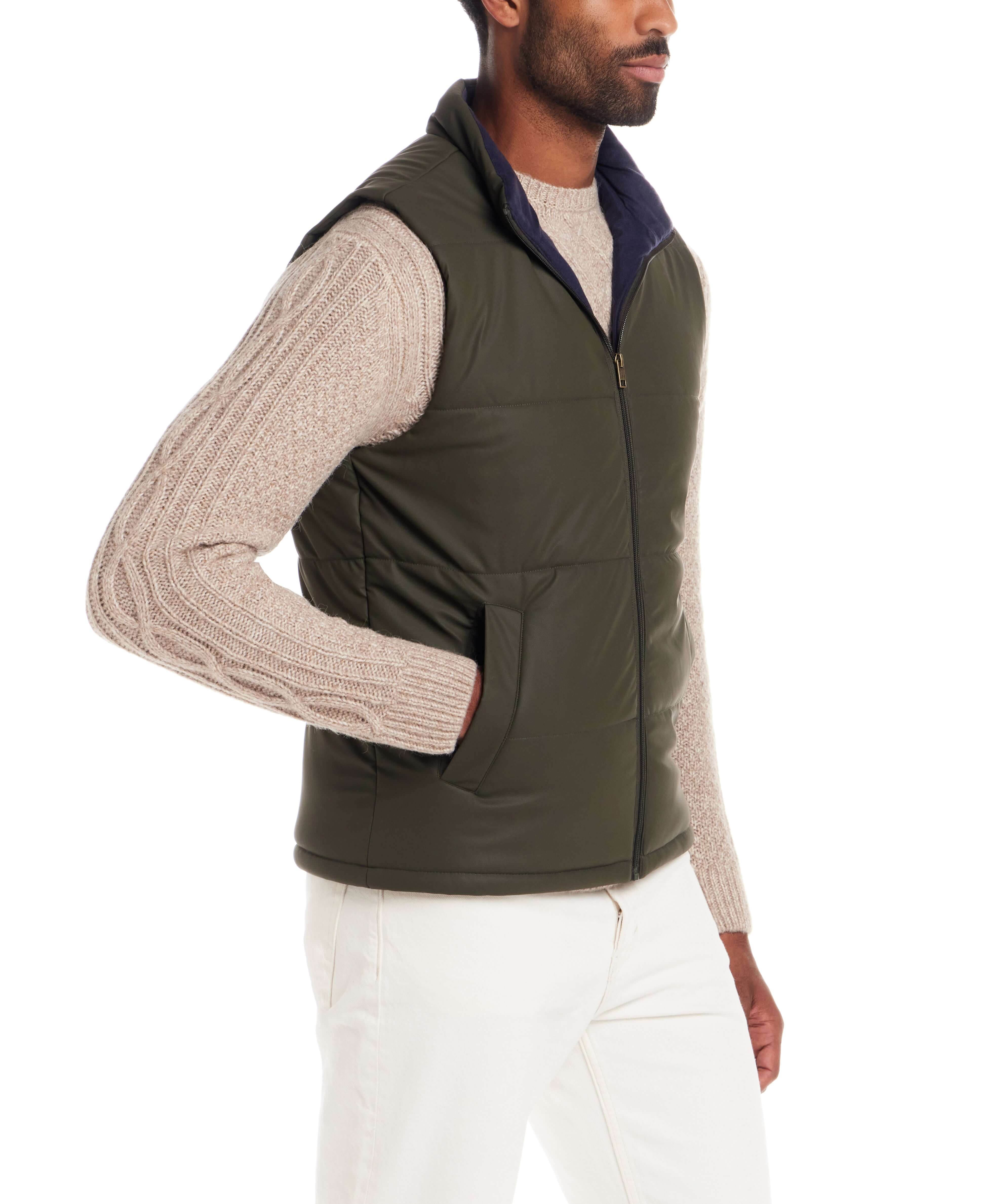 Matte Coated Shell Puffer Vest in Kambaba Olive worn by a model, featuring zip-front closure and side pockets.