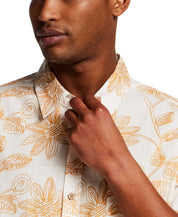 100% Cotton Linen-Texture Shirt in Sunrise featuring a subtle floral pattern, model showcasing short-sleeve design.