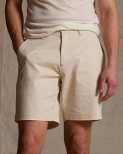 The 8" Twill Short in Stone, featuring a flat front and side pockets, perfect for warm weather outings.