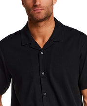 Seersucker Coatfront Knit in Black featuring a subtle grid texture and structured collar.