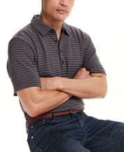 Jacquard Stripe Polo in Black worn by model, showcasing its subtle texture and classic style.