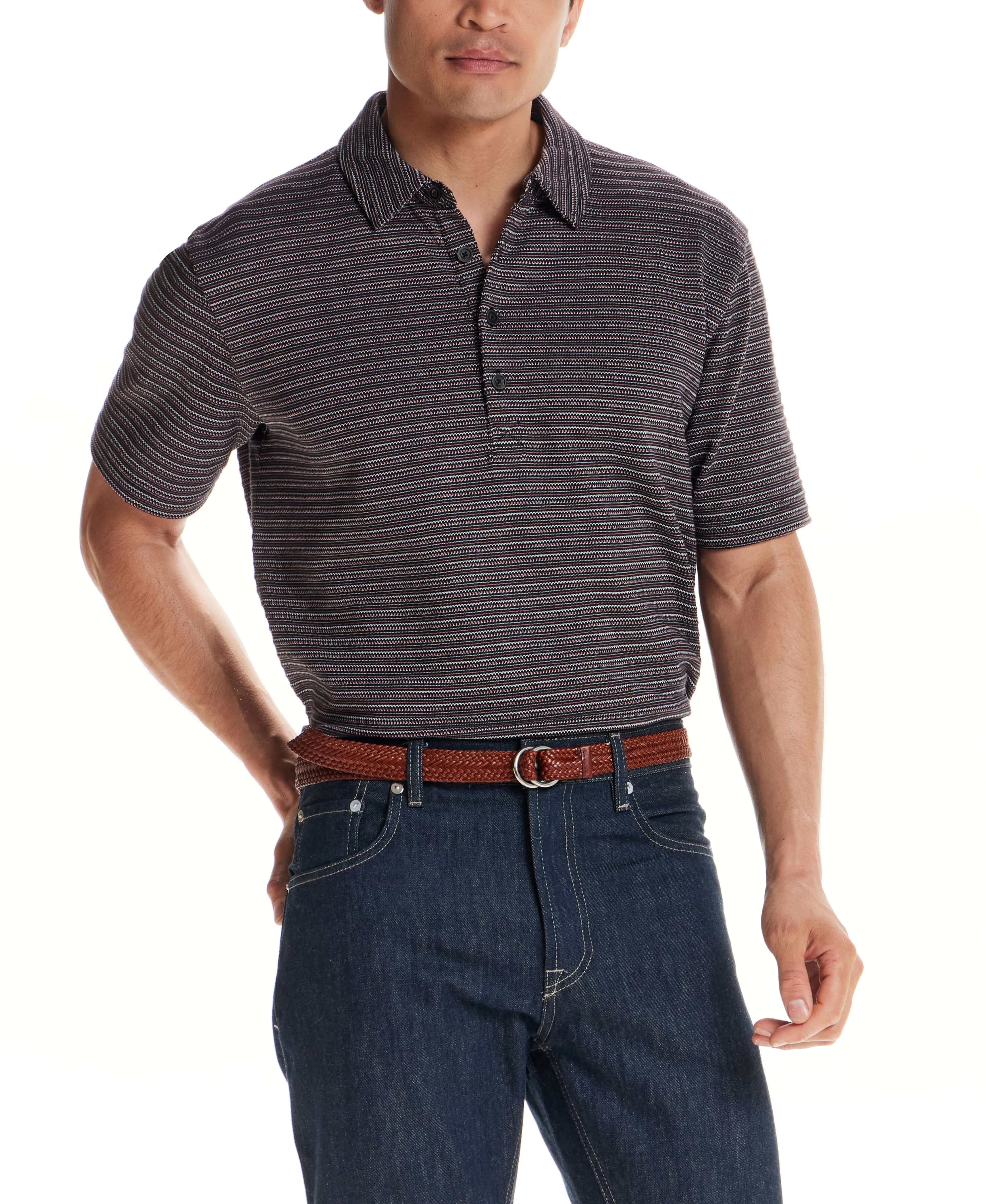 Man wearing a Jacquard Stripe Polo in Black with short sleeves and a three-button placket.