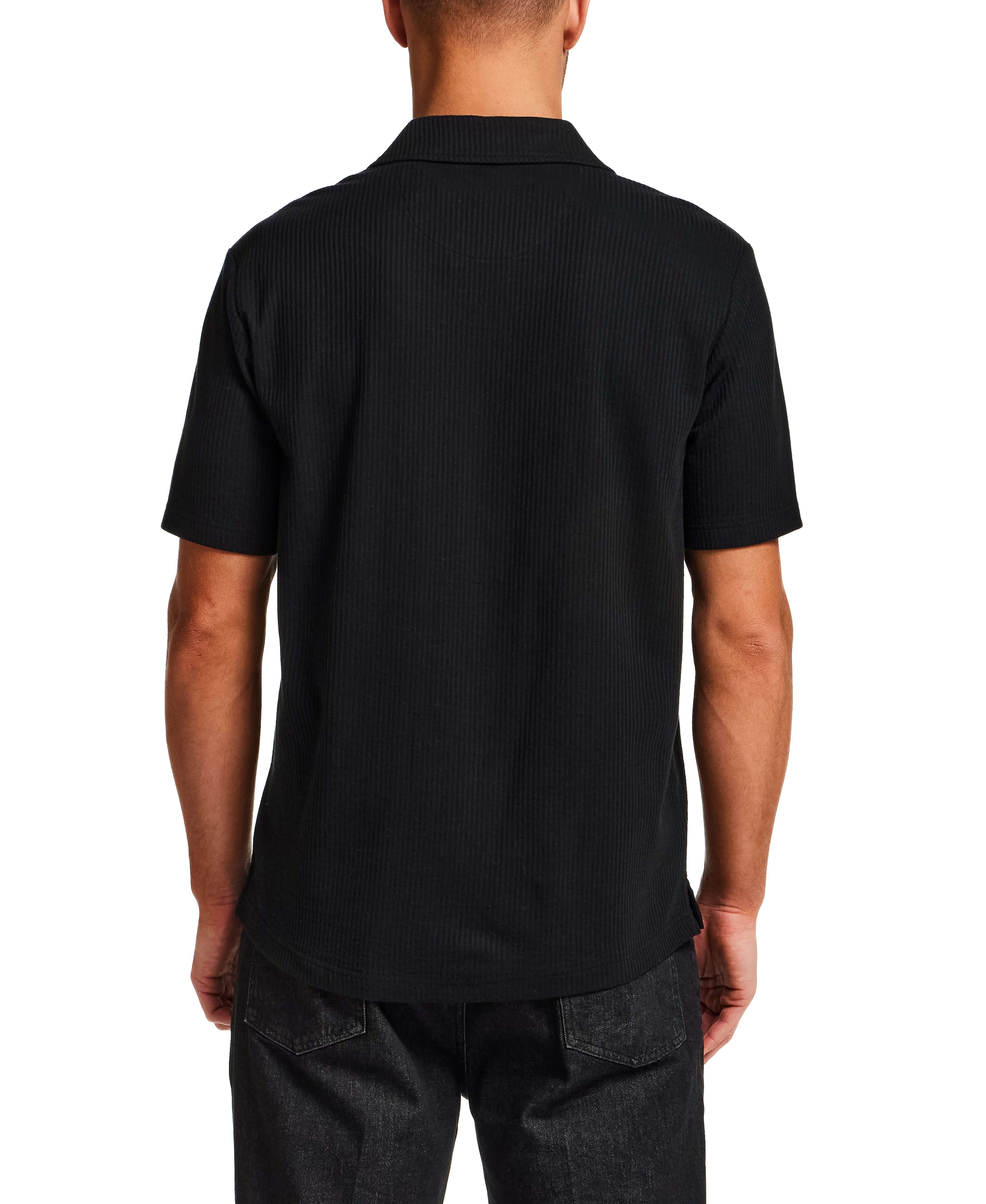 Back view of Seersucker Coatfront Knit in Black showcasing the structured collar and subtle grid texture.