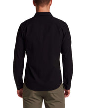 Back view of a man wearing a Seersucker Shirt in Black, showcasing the textured fabric and button-front design.