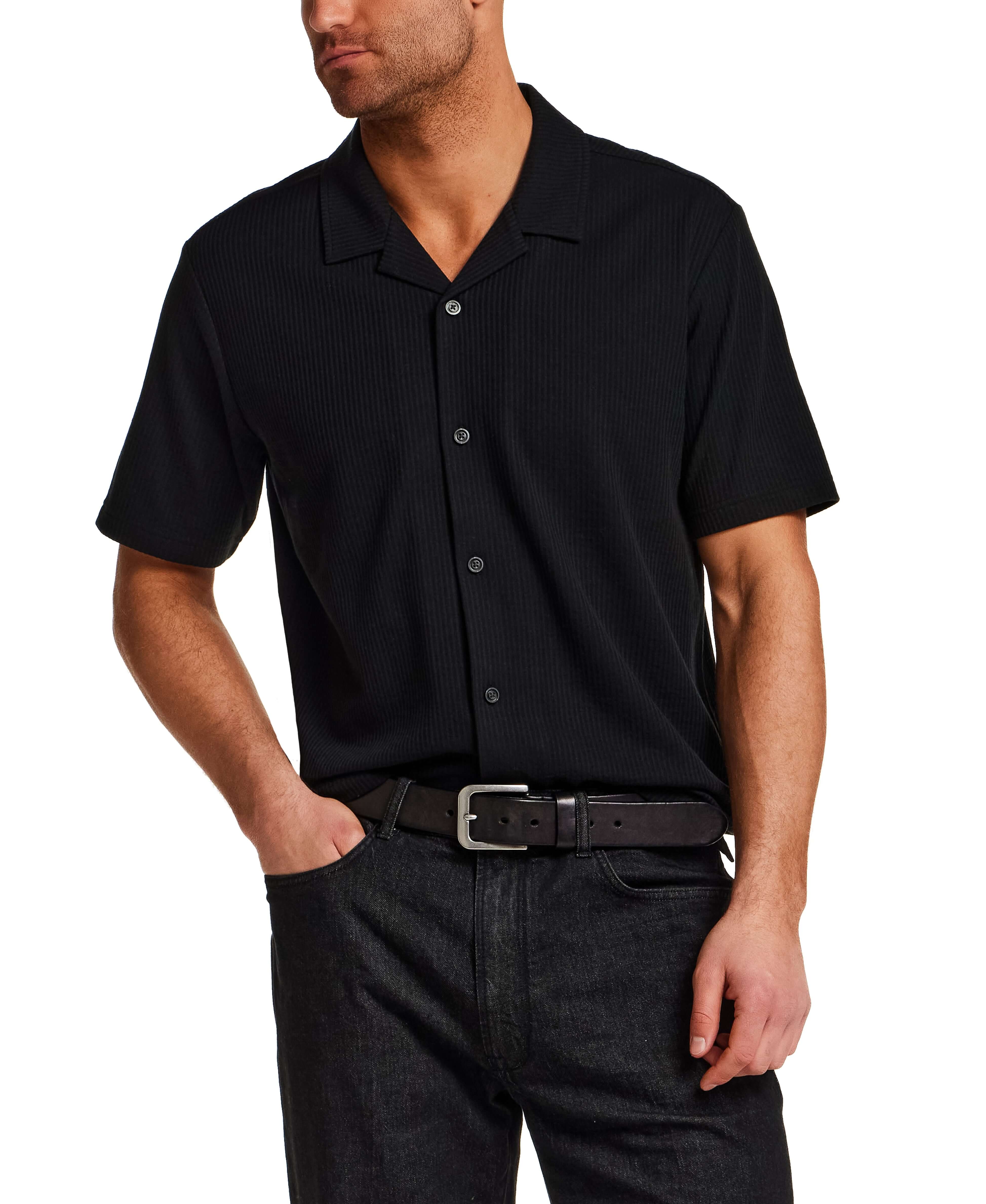 Seersucker Coatfront Knit in Black displayed on a model, featuring a structured collar and button-front closure.