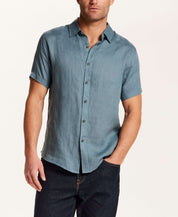 Short-Sleeve Linen Shirt in Blue worn by a man, featuring a spread collar and short sleeves in soft slate blue.