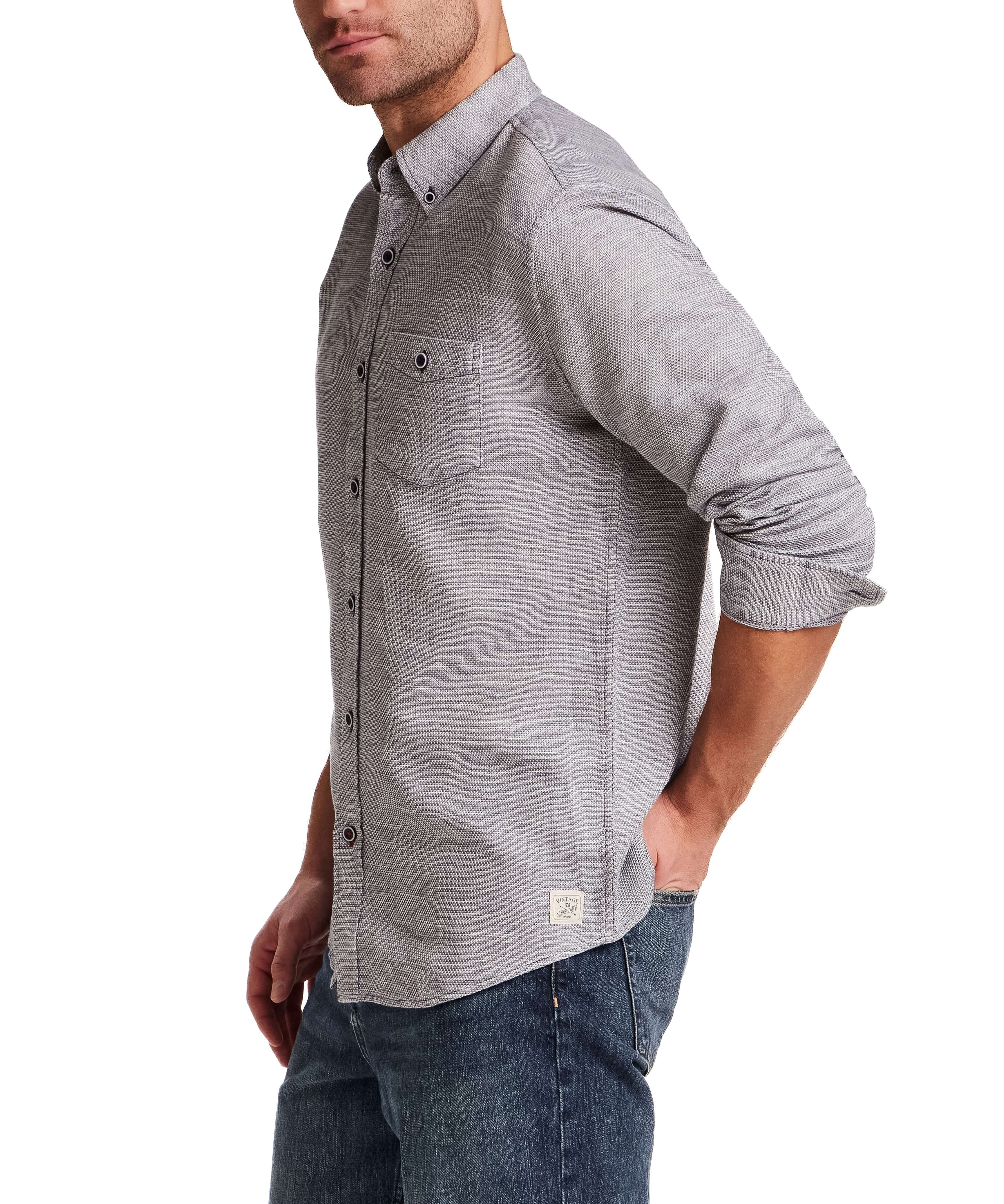 Pebble Dobby Button-Down Shirt in Maritime Blue, shown on model, featuring button-down collar and chest pocket.