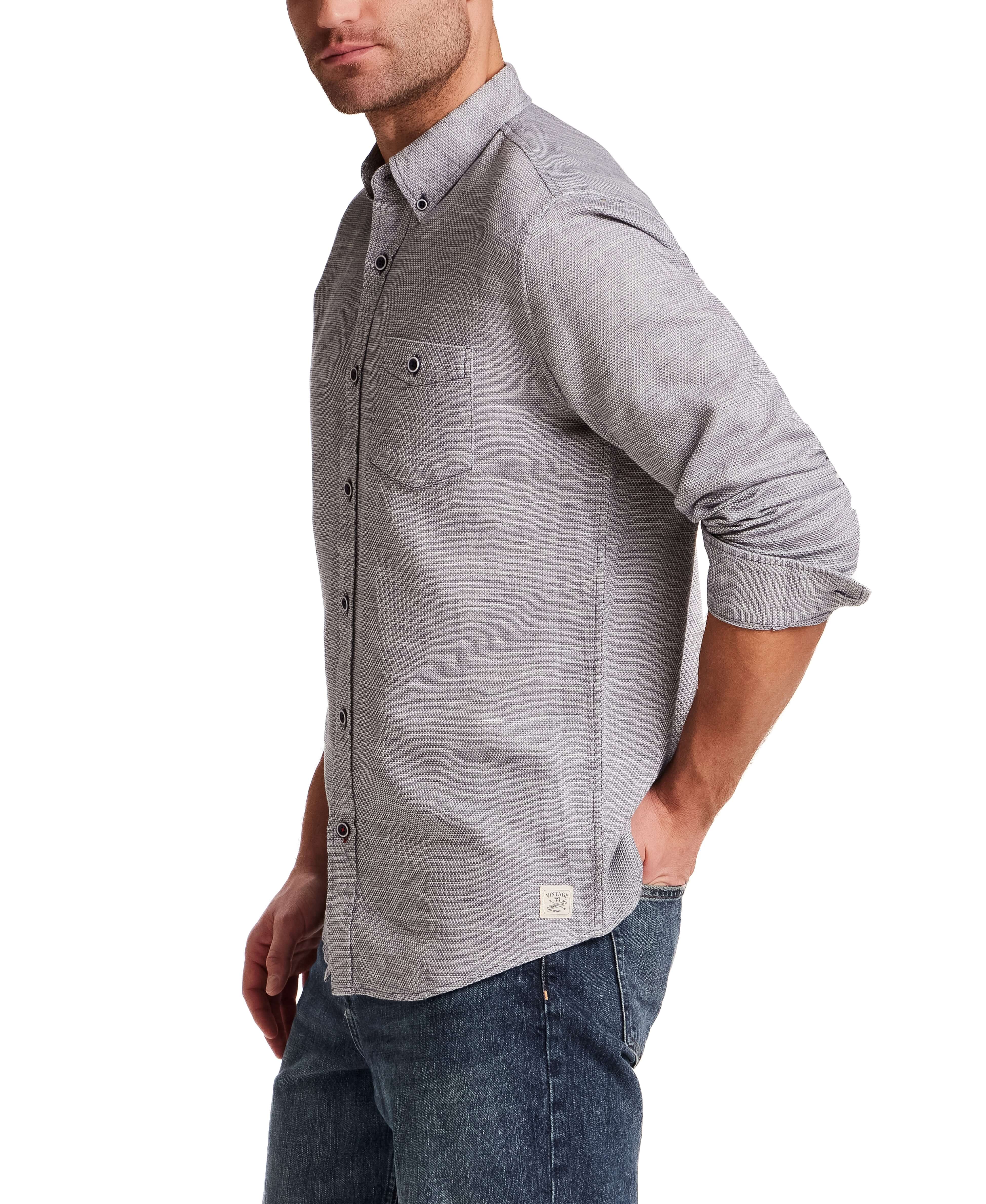 Pebble Dobby Button-Down Shirt in Maritime Blue, shown on model, featuring button-down collar and chest pocket.
