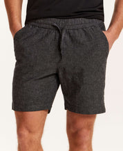 Chambray Stripe Drawstring Short in Black featuring an elastic waistband and side pockets, perfect for warm days.