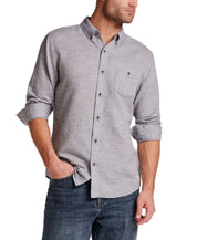 Pebble Dobby Button-Down Shirt in Maritime Blue on model, showcasing textured fabric and button-down collar.