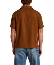 Cotton Gauze Herringbone Polo in Retro Brown, back view showcasing short sleeves and relaxed fit.