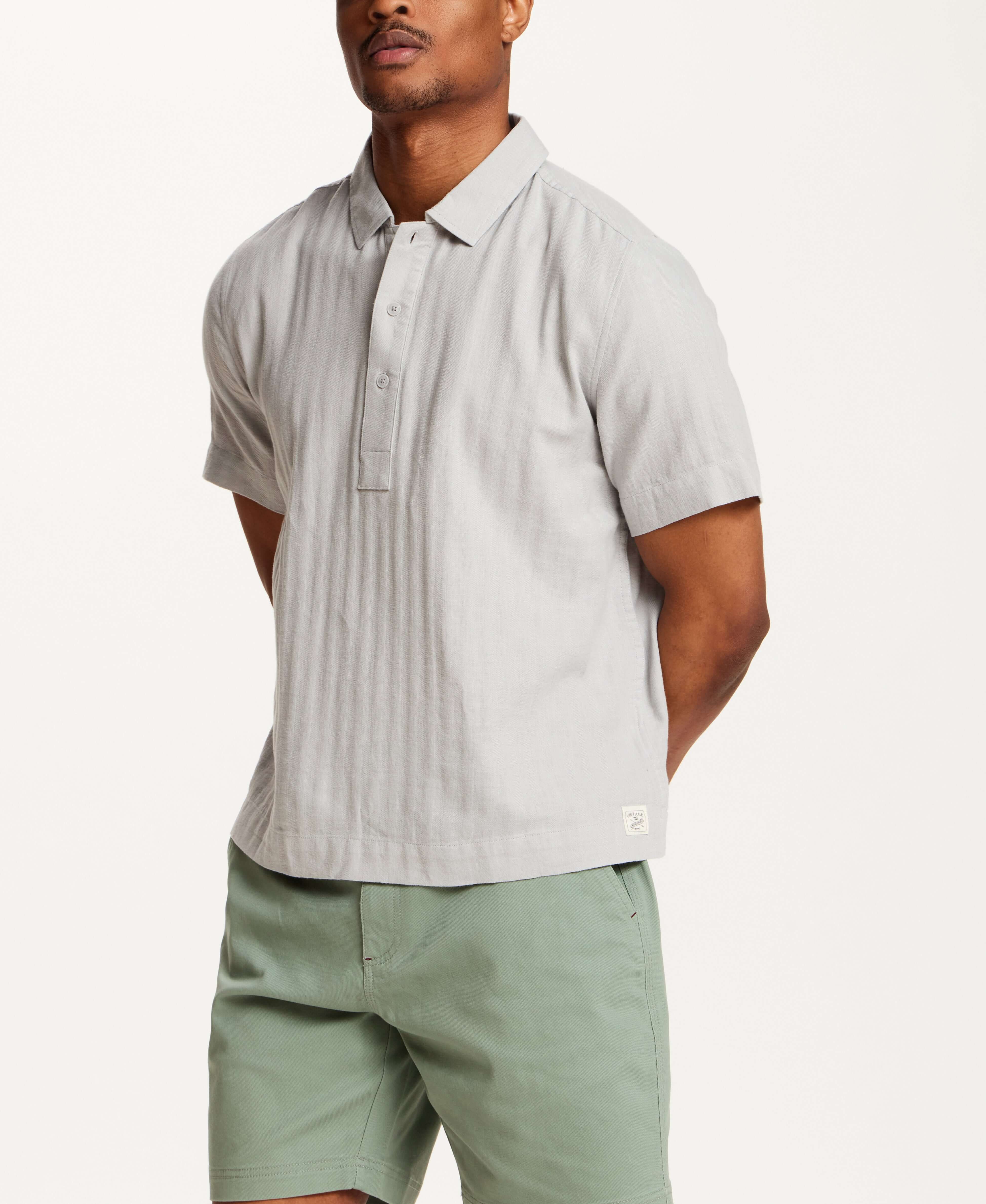 Cotton Gauze Herringbone Polo in Vapor Grey worn by a male model, featuring short sleeves and a three-button placket.